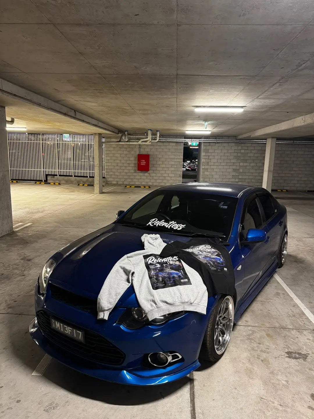 Blue Ford Falcon with custom RevDrop Relentless hoodie and tee